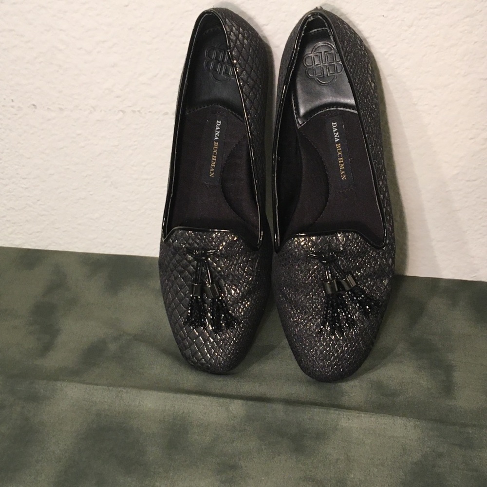 Black and silver slide on loafers with tassel